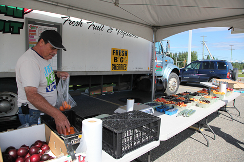 Ed sells fruits from the Okanagan in Quesnel